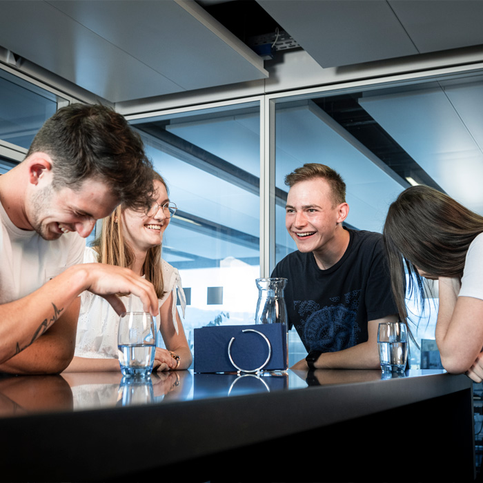 group-of-colleagues-mid-casual-conversation